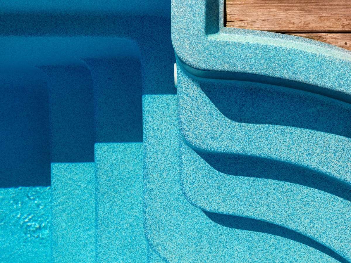 Pool stairs with non-slip concrete paint for added safety